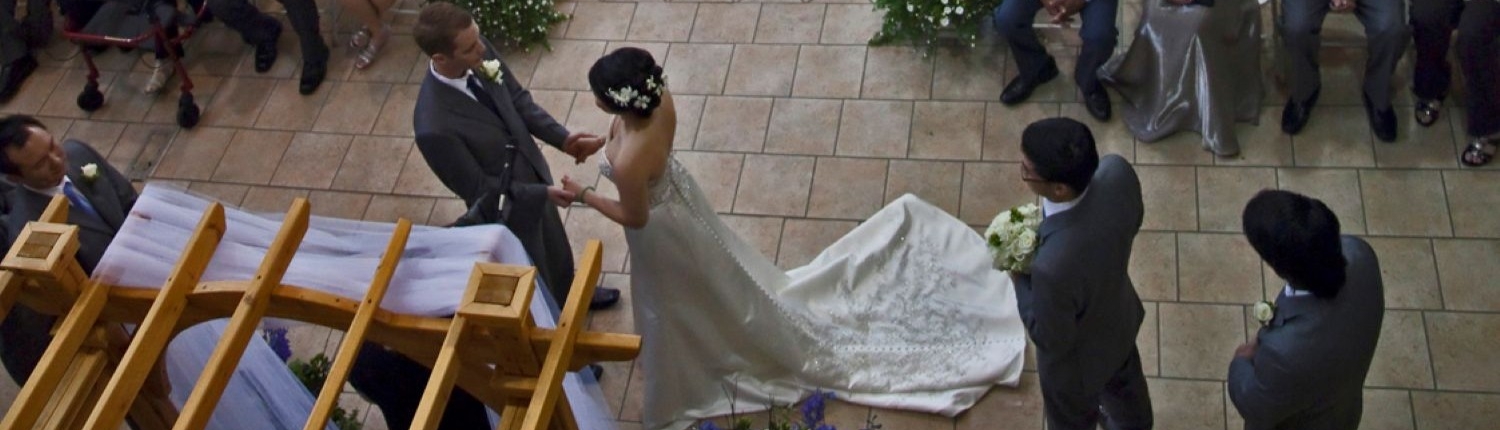 Indoor wedding ceremony setup in the Atrium at the Fairfield Arts & Convention Center in Fairfield, Iowa.