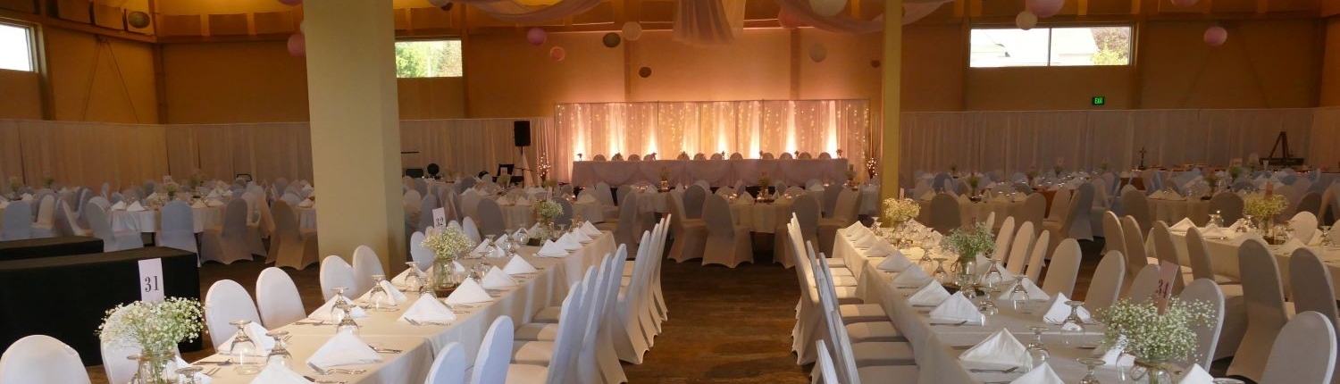 Combined Cambridge and Smith rooms set for an intimate wedding reception at the Fairfield Arts & Convention Center in Fairfield, Iowa.