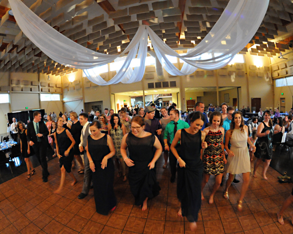 Guests dancing during a wedding reception in the Expo Hall at the Fairfield Arts & Convention Center in Fairfield, Iowa