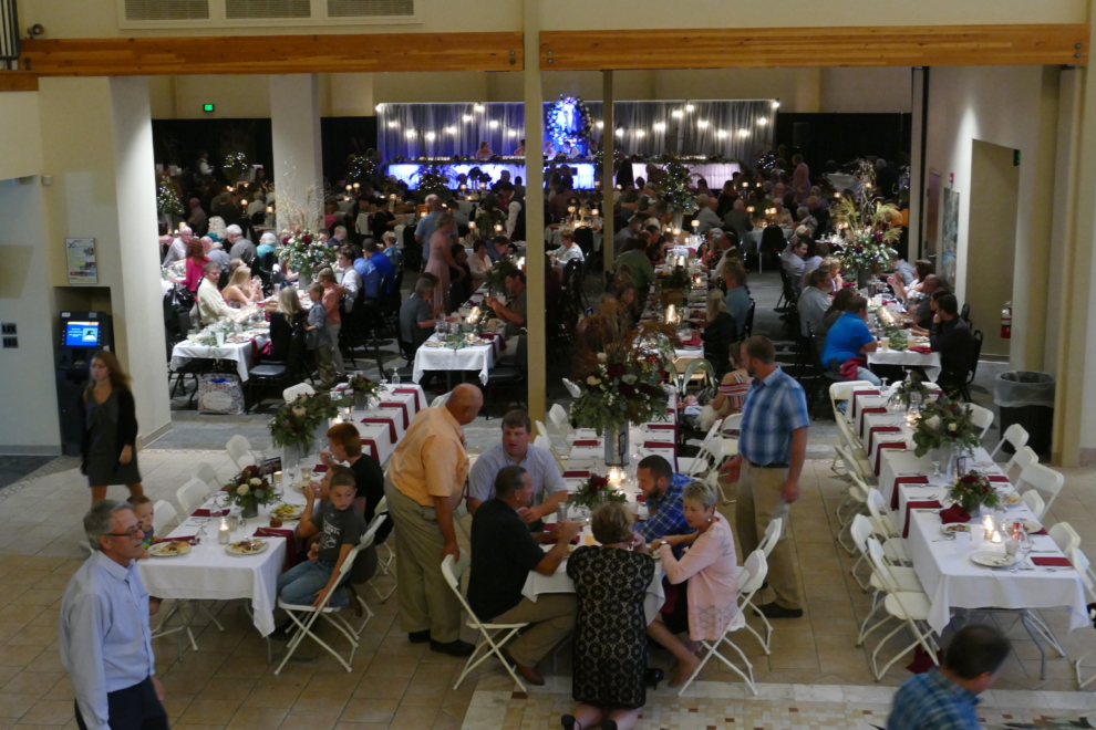 View of a wedding reception in the Expo Hall at the Fairfield Arts & Convention Center in Fairfield, Iowa, seen from the Atrium balcony.